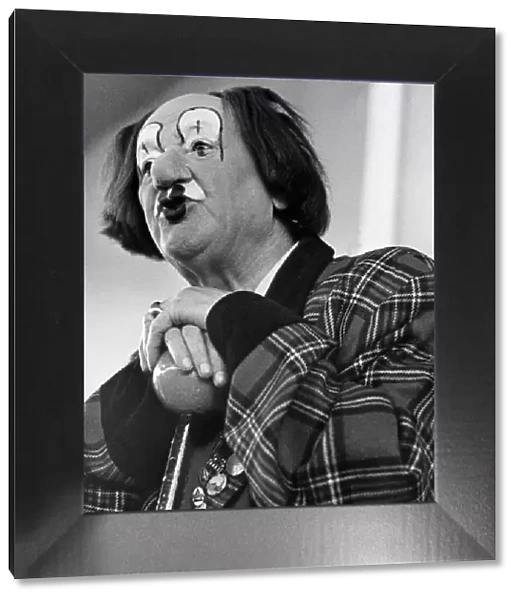 Coco the Clown, created by Nicolai Poliakoff OBE. Coco the Clown talking to children in