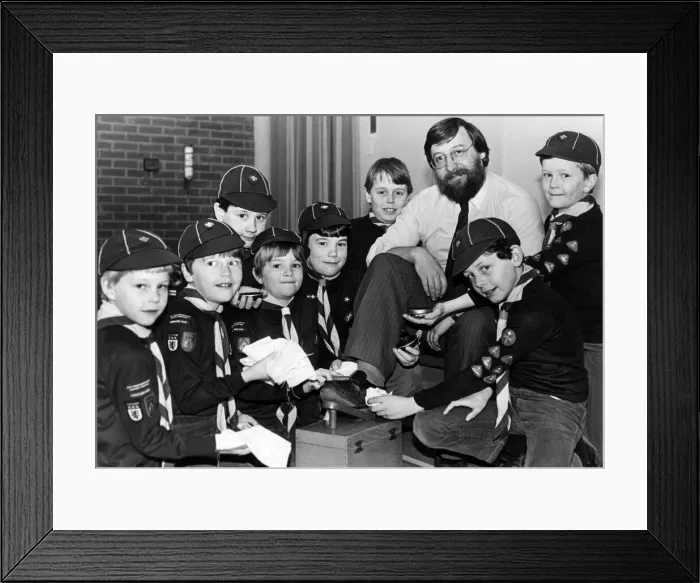 Framed Print : Many hands making light work for a group of Middlesbrough Cub Scouts brushing up on their