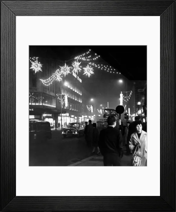Framed Print : Christmas shopping as shimmering Stars hang over Lord Street in Liverpool, Merseyside Framed Print : Christmas shopping as shimmering Stars hang over Lord Street in Liverpool, Merseyside