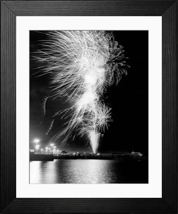 Framed Print : Crowds gather on the sea front and promenade at New Brighton to watch a spectacular Framed Print : Crowds gather on the sea front and promenade at New Brighton to watch a spectacular