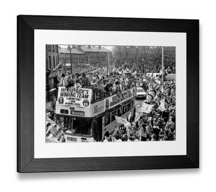 Framed Print : The Liverpool FC Victory Bus passes through Liverpool City Centre as the players enjoy a