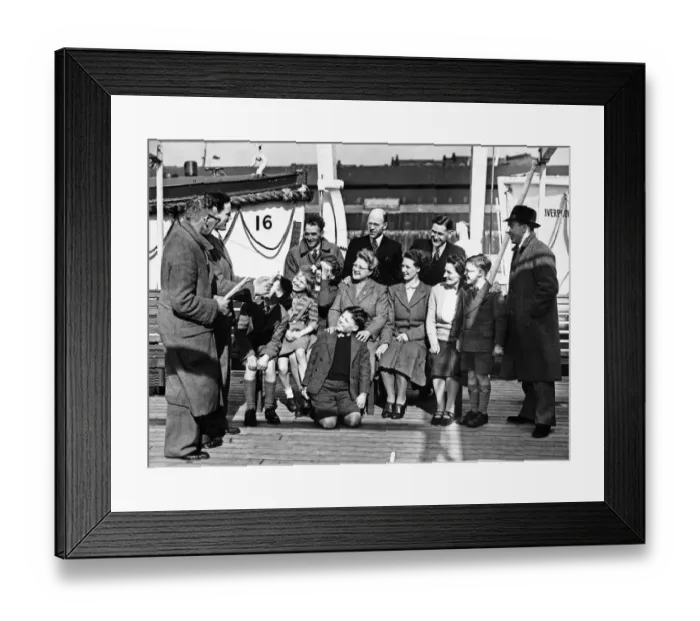 Framed Print : A group of people on board the liner Georgie in Liverpool docks