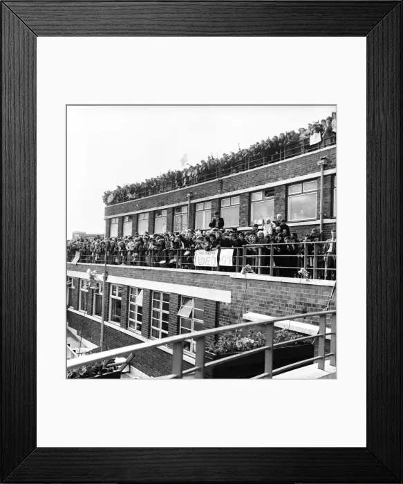 Framed Print : Beatles fans packed onto a building terrace and rooftop as they try to get a glimpse of Framed Print : Beatles fans packed onto a building terrace and rooftop as they try to get a glimpse of