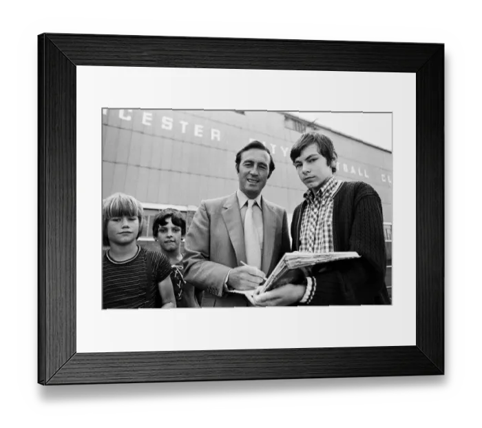 Framed Print : Leicester City manager Jimmy Bloomfield signs autographs for fans outside Filbert Street