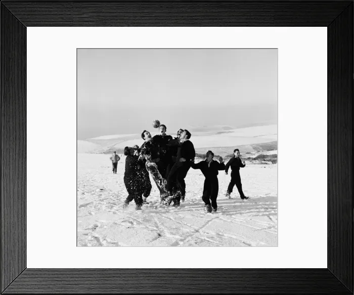 Framed Print : Charlton Athletic football team training in the snow at Eastbourne, Kent