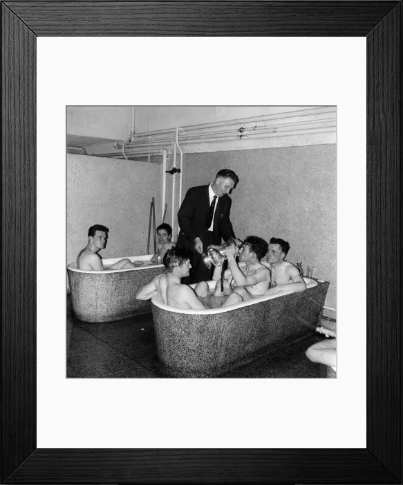 Framed Print : Tottenham Hotspur Double Winnkng Season 1960 - 1961. A Spurs player drinks from the FA Framed Print : Tottenham Hotspur Double Winnkng Season 1960 - 1961. A Spurs player drinks from the FA