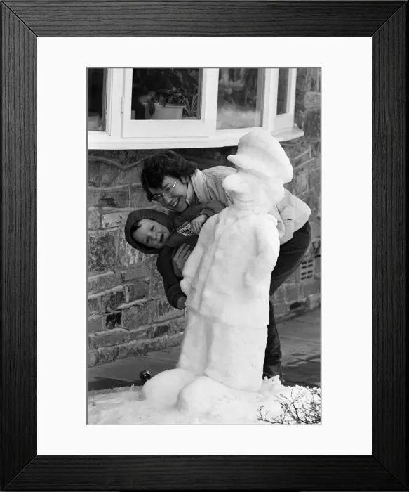 Framed Print : It Postman Pat... Mrs Christine Dixon and two year-old Tristan with their special
