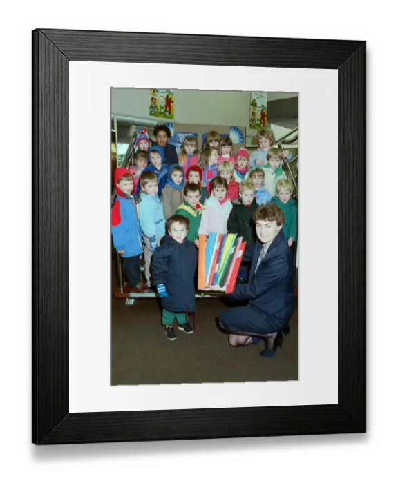 Framed Print : Luke Walker, from Marsden Nursery School, is seen with classmates who visited W H Smith Framed Print : Luke Walker, from Marsden Nursery School, is seen with classmates who visited W H Smith