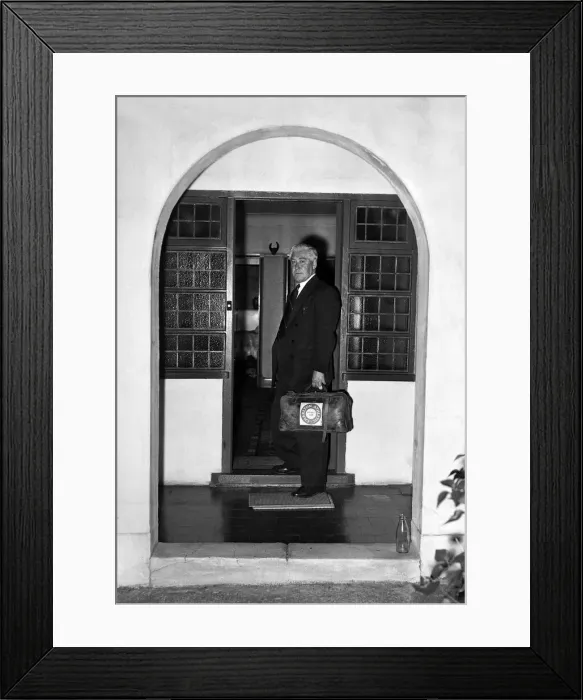 Framed Print : Charlton Athletic manager Jimmy Seed returns home after his sacking on September 3, 1956