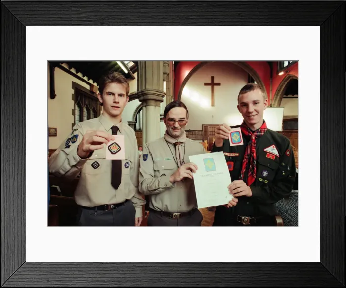 Framed Print : Assistant County Commissioner David Clark (centre) congratulates scouts Paul Barker (l Framed Print : Assistant County Commissioner David Clark (centre) congratulates scouts Paul Barker (l