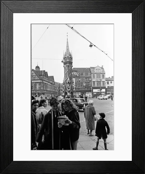 Framed Print : Leicester fans in the city centre reading the newspapers eager to hear of any news before Framed Print : Leicester fans in the city centre reading the newspapers eager to hear of any news before