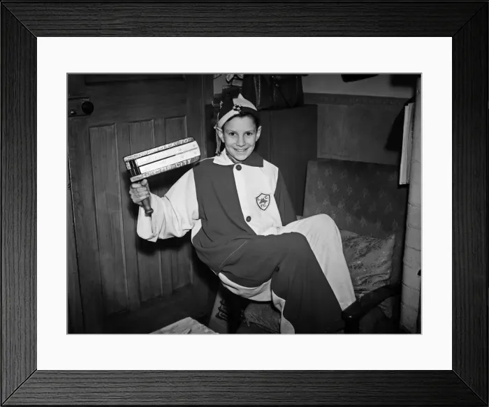 Framed Print : Young Leicester City football club mascot holding his rattle wearing his costume Framed Print : Young Leicester City football club mascot holding his rattle wearing his costume