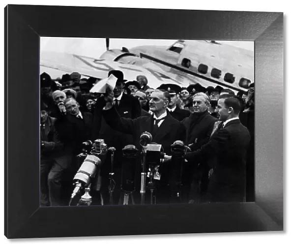 Neville Chamberlain seen here at Heston Airport after returning from his summit meeting