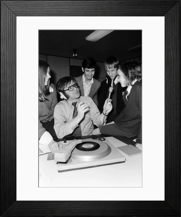 Framed Print : Ed Doolan BRMB Radio Disc Jockey, pictured with news boys and girls, Birmingham Framed Print : Ed Doolan BRMB Radio Disc Jockey, pictured with news boys and girls, Birmingham
