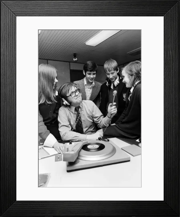 Framed Print : Ed Doolan BRMB Radio Disc Jockey, pictured with news boys and girls, Birmingham Framed Print : Ed Doolan BRMB Radio Disc Jockey, pictured with news boys and girls, Birmingham