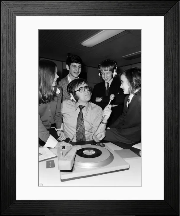 Framed Print : Ed Doolan BRMB Radio Disc Jockey, pictured with news boys and girls, Birmingham Framed Print : Ed Doolan BRMB Radio Disc Jockey, pictured with news boys and girls, Birmingham