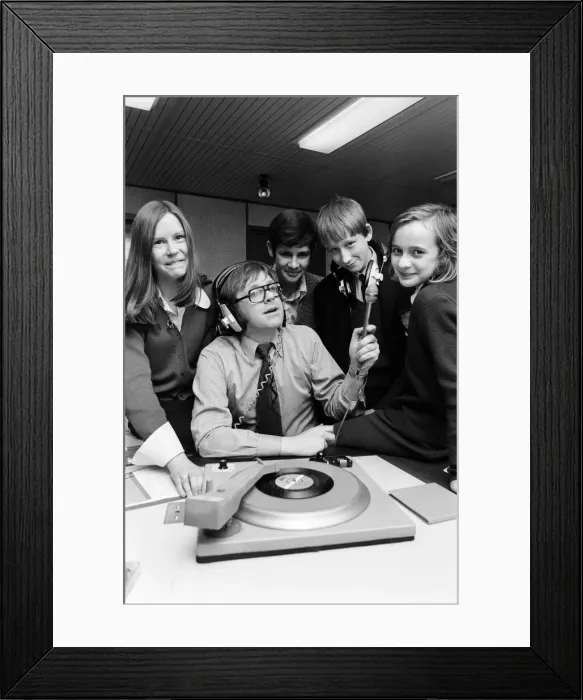 Framed Print : Ed Doolan BRMB Radio Disc Jockey, pictured with news boys and girls, Birmingham Framed Print : Ed Doolan BRMB Radio Disc Jockey, pictured with news boys and girls, Birmingham