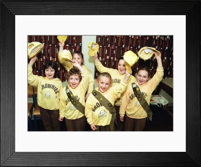 Framed Print : Members of the 1st Billingham Brownie pack celebrating getting a cash grant to be spent