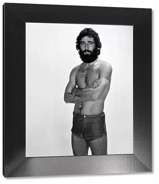 Charlton Athletic footballer Derek Hales poses in the Mirror studio. December 1976