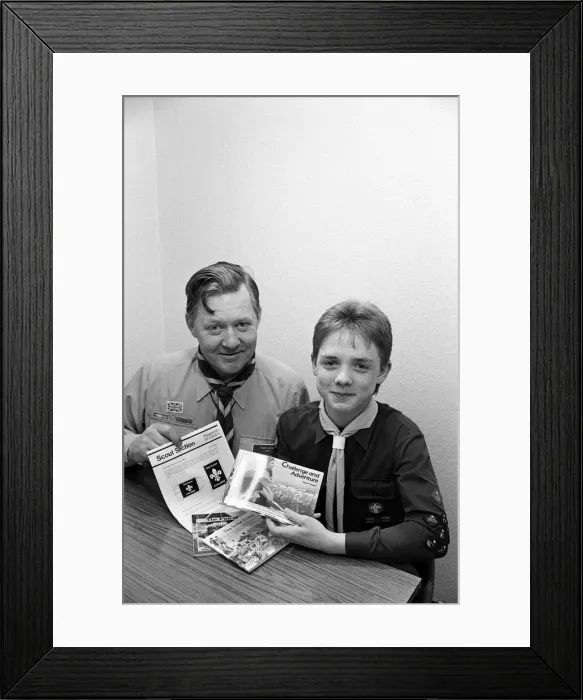 Framed Print : Longwood scout Andrew Crosland, pictured with assistant county commissioner Mr Roger Framed Print : Longwood scout Andrew Crosland, pictured with assistant county commissioner Mr Roger