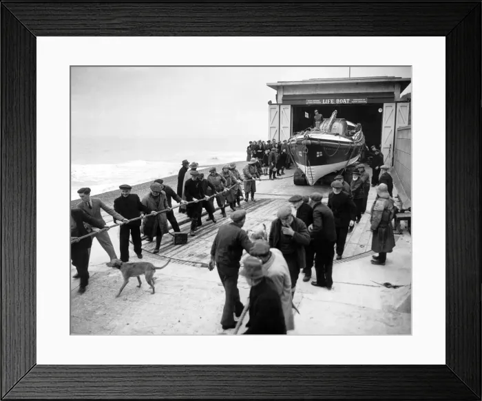 Framed Print : Lifeboatmen of Sheringham, Norfolk stand by during operational flights over the North Sea Framed Print : Lifeboatmen of Sheringham, Norfolk stand by during operational flights over the North Sea