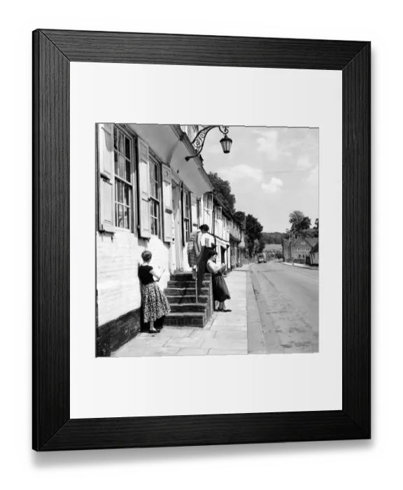 Framed Print : Women of West Wycombe in Buckinghamshire standing in the street making sketches of local