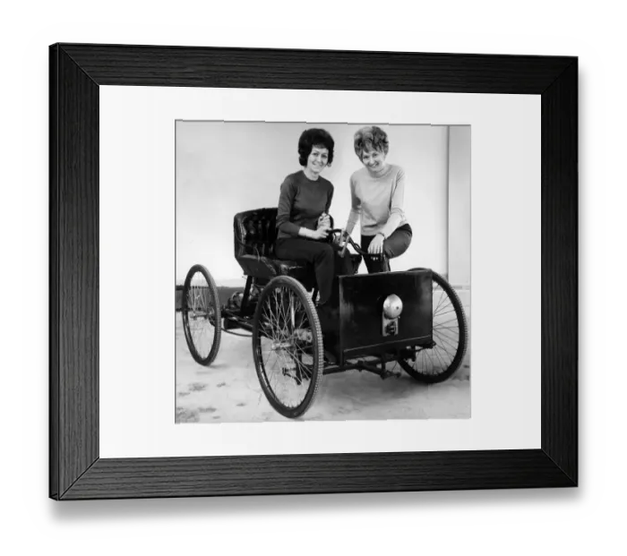 Framed Print : Replica Henry Ford Quadricycle being tried out by office girls Joan Milner