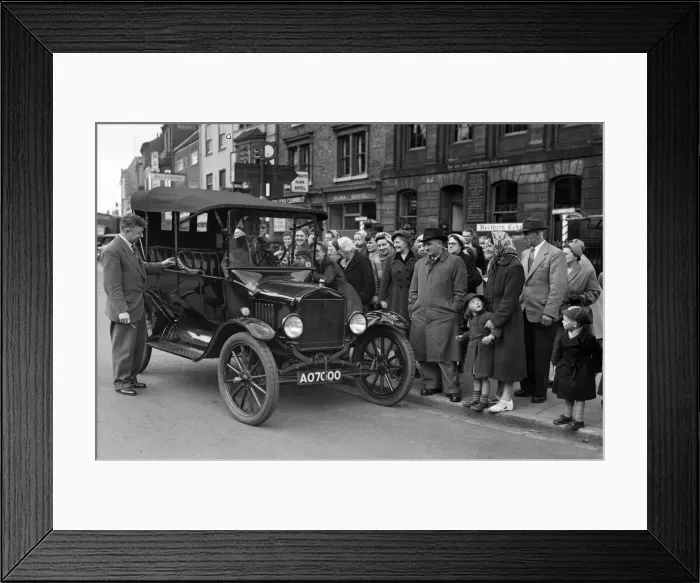 Framed Print : An interested crowd gathers round this T Model Ford car as it pulls up in Stockton High Framed Print : An interested crowd gathers round this T Model Ford car as it pulls up in Stockton High