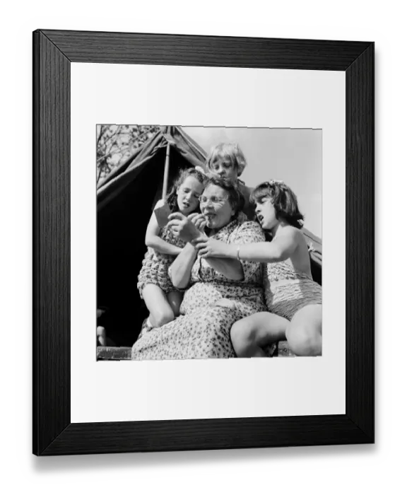 Framed Print : Grandmother Rosina Cox shows her grandchildren 10 year old Frances Gee Framed Print : Grandmother Rosina Cox shows her grandchildren 10 year old Frances Gee
