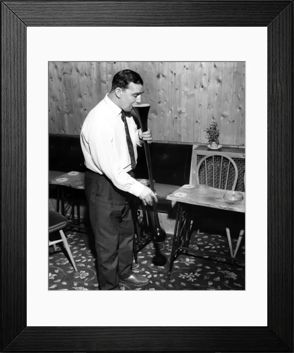 Framed Print : Joe Goodluck starts on a yard of ale at his local pub October 1964 Framed Print : Joe Goodluck starts on a yard of ale at his local pub October 1964