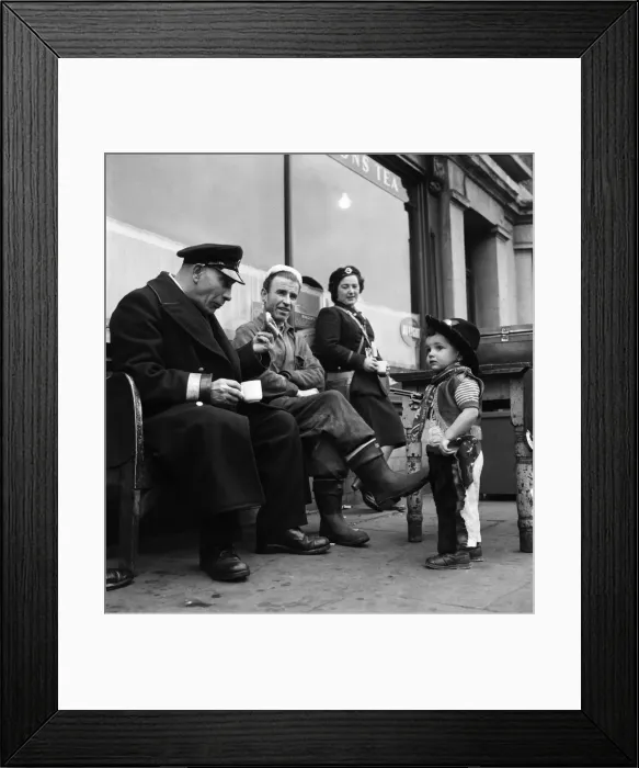 Framed Print : Allen holds up the busmen having their snack near his home, after all Framed Print : Allen holds up the busmen having their snack near his home, after all