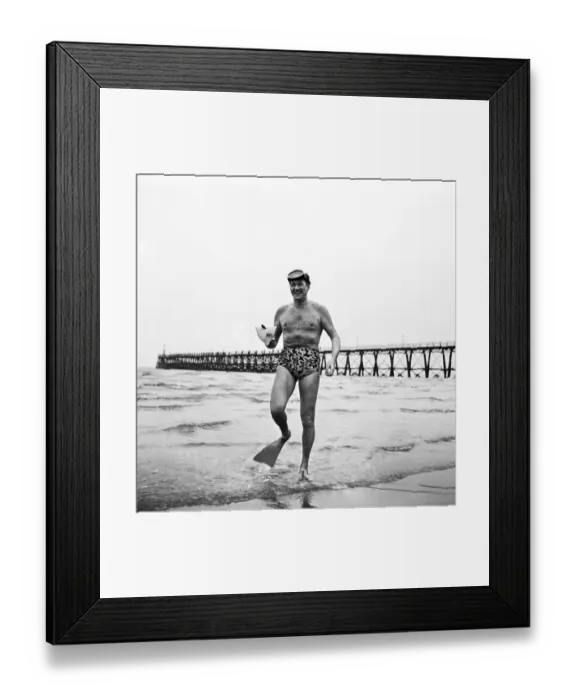 Framed Print : American film actor Sonny Tufts peparing to take the water at Blackpool in search of fish
