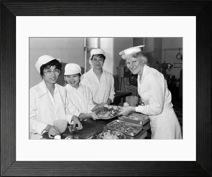 Framed Print : From left Mona Chan yu Chun, Velly Intan and Michelle Li Cho Man discuss a Chinese meal