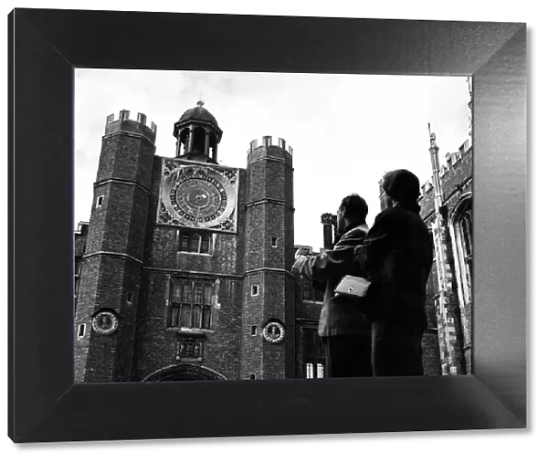 Astronomical clock at Hampton Court Palace, London. October 1952