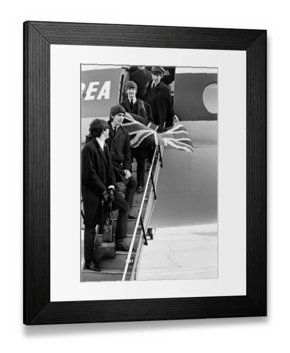 Framed Print : The Beatles return from Paris on BEA flight, landing at London Heathrow Airport