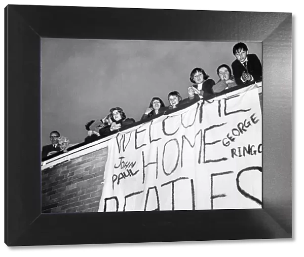 Beatles fans at London Heathrow Airport look forward to welcoming home The Beatles