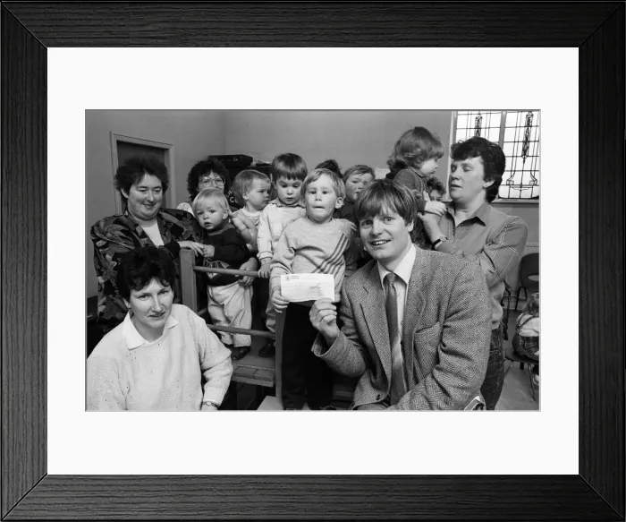 Framed Print : Three-year-old Phillip Auckland presents a £50 cheque from Denby Dale Mothers Framed Print : Three-year-old Phillip Auckland presents a £50 cheque from Denby Dale Mothers