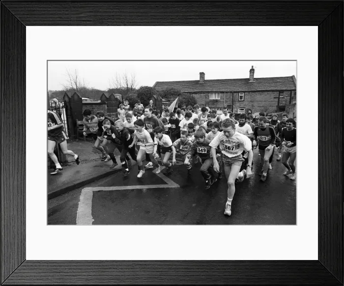 Framed Print : They re off... setting out on a six-mile fun run are girls Framed Print : They re off... setting out on a six-mile fun run are girls
