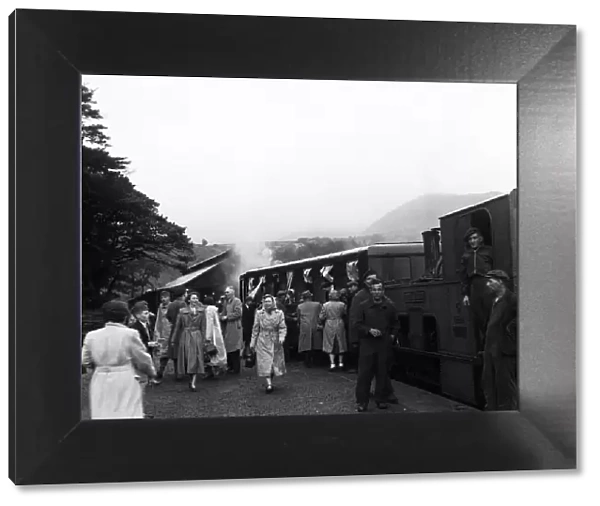 Holidaymakers board the steam train at the summit of Snowdon in Llanberis