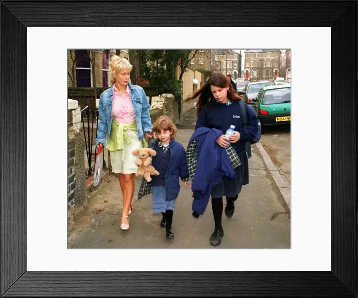 Framed Print : PAULA YATES WALKS TWO OF HER DAUGHTERS FIFI TRIXABELLE AND PEACHES TO SCHOOL TODAY