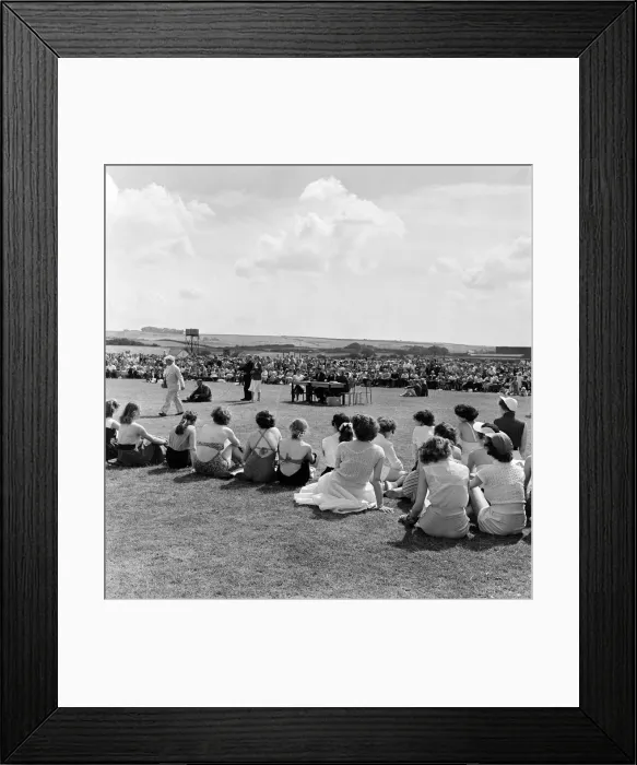 Framed Print : Crowds of holidaymakers watching outdoor entertainment at Butlins Holiday Camp, Filey Framed Print : Crowds of holidaymakers watching outdoor entertainment at Butlins Holiday Camp, Filey