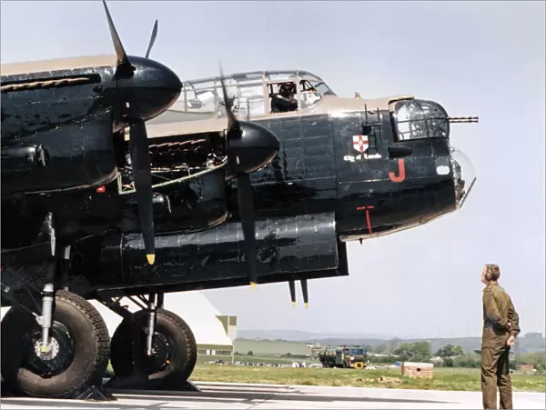 A Second World War Avro Lancaster bomber pictured leaving RAF St Athan after a refit