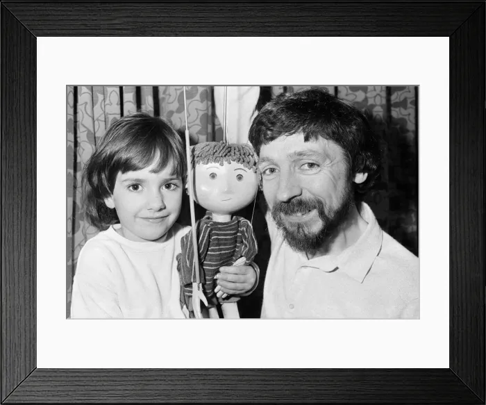 Framed Print : Puppet on a string... Four-year-old Rosie Smith has found a new friend - Ben Framed Print : Puppet on a string... Four-year-old Rosie Smith has found a new friend - Ben