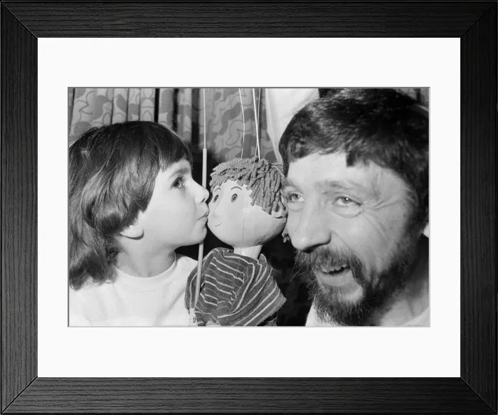 Framed Print : Puppet on a string... Four-year-old Rosie Smith has found a new friend - Ben Framed Print : Puppet on a string... Four-year-old Rosie Smith has found a new friend - Ben