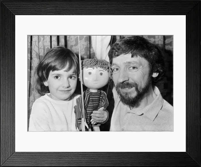 Framed Print : Puppet on a string... Four-year-old Rosie Smith has found a new friend - Ben Framed Print : Puppet on a string... Four-year-old Rosie Smith has found a new friend - Ben