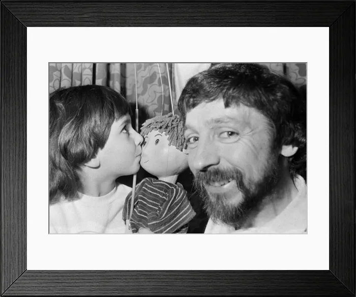 Framed Print : Puppet on a string... Four-year-old Rosie Smith has found a new friend - Ben Framed Print : Puppet on a string... Four-year-old Rosie Smith has found a new friend - Ben