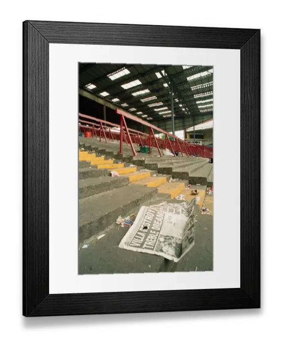 Framed Print : The Holte End stand at Villa Park is demolished by workmen. 10th May 1994