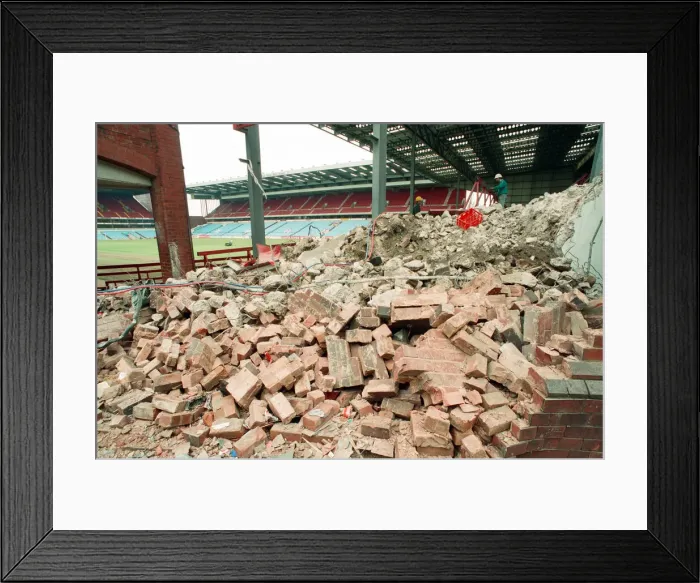 Framed Print : The Holte End stand at Villa Park is demolished by workmen. 10th May 1994 Framed Print : The Holte End stand at Villa Park is demolished by workmen. 10th May 1994