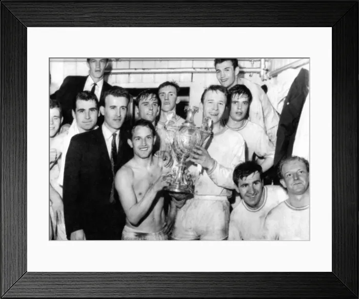 Framed Print : Sport - Football - Swansea Town players hold aloft the Welsh Cup in their dressing room