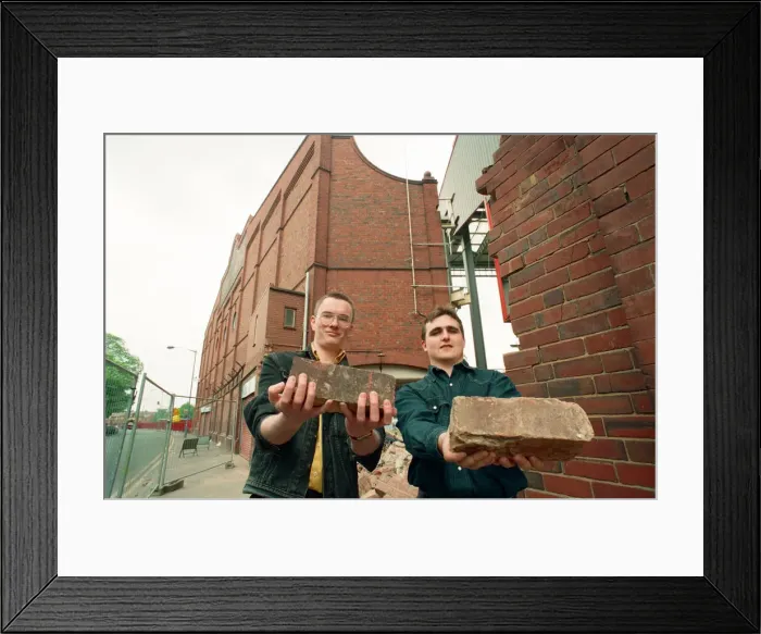 Framed Print : The Holte End stand at Villa Park is demolished by workmen. 10th May 1994 Framed Print : The Holte End stand at Villa Park is demolished by workmen. 10th May 1994